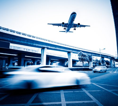 Airport-transfers blurred street scene in city of China.