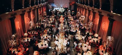 Special-Events round tables in celebration hall with full of guests